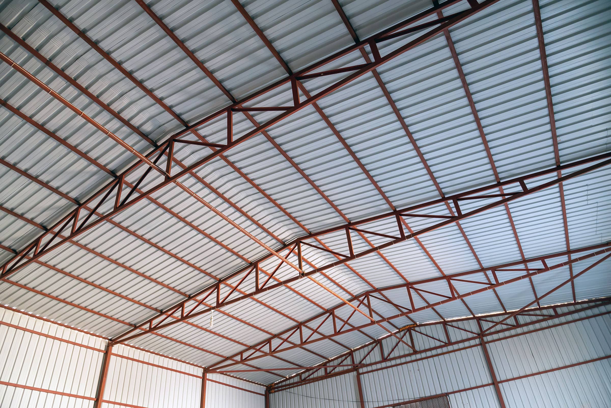 Photo showing parts of roof truss in steel building